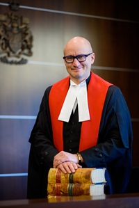 Photo of Justice Nicholas Devlin